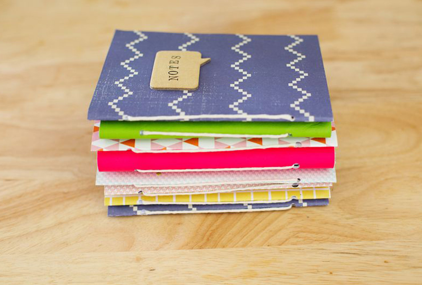 stack of patterned notebooks