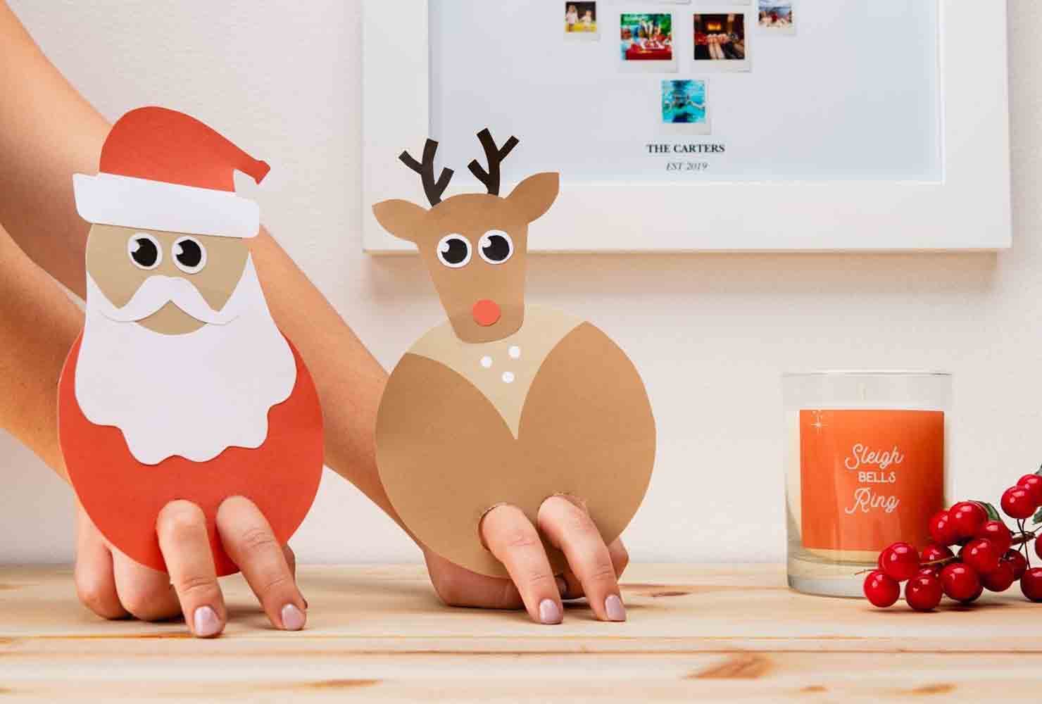 finger puppets of Santa and Rudolph