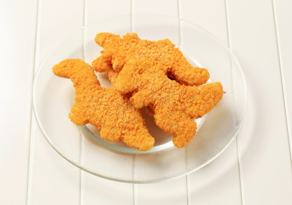 Dinosaur-shaped breaded fish fillets