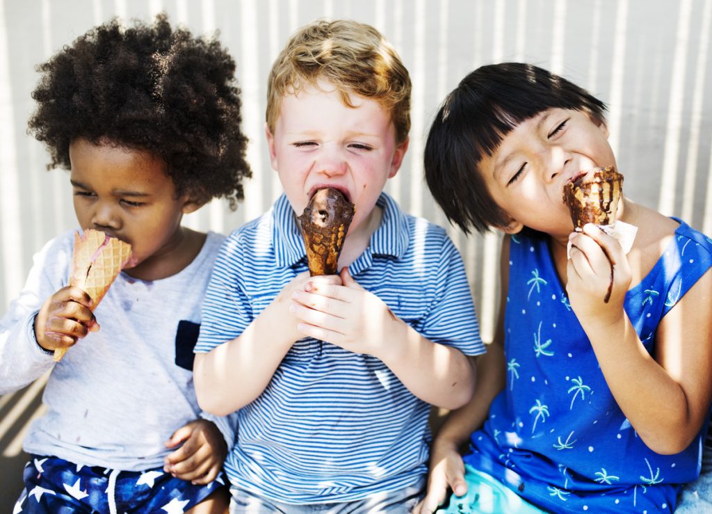 Children enjoying ice cream.