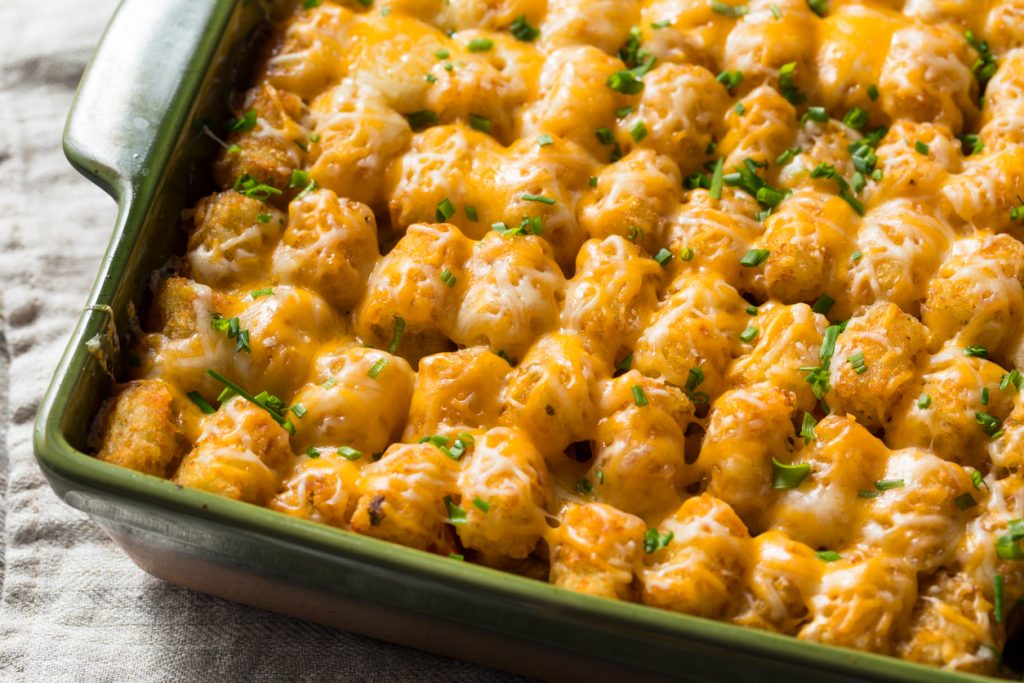 Homemade Tater Tot Hot dish Casserole with Beef and Cheese for Birthday Party Food.