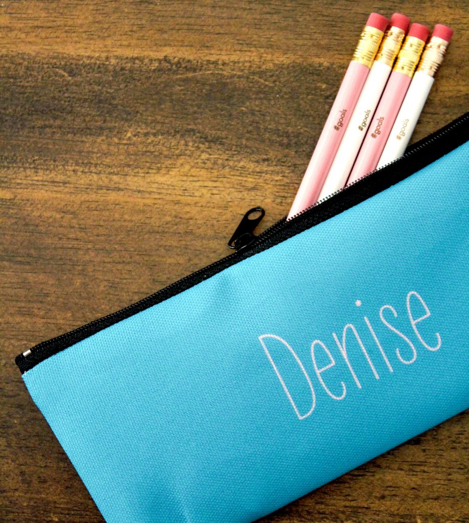 Personalized Pencil Pouch with pencils for a fun school organization hack.