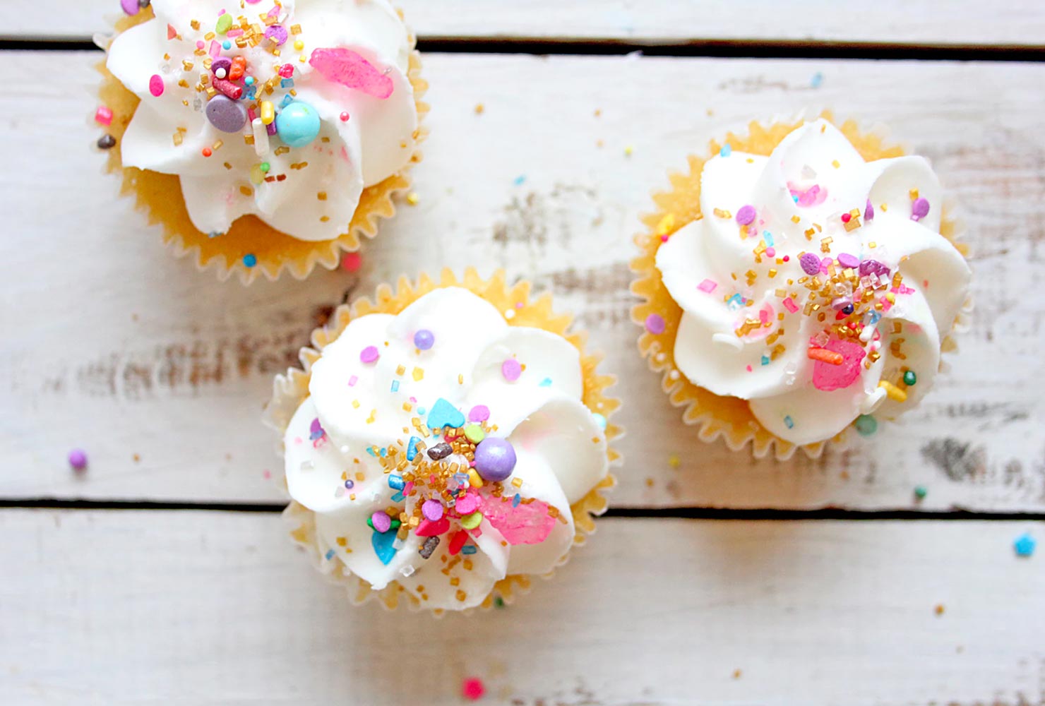Cupcakes with colorful sprinkles.