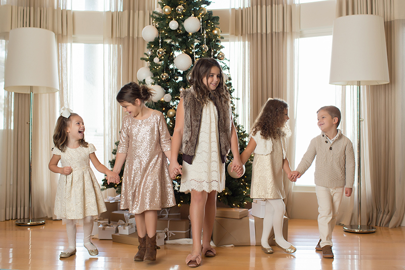 christmas photo of kids holding hands
