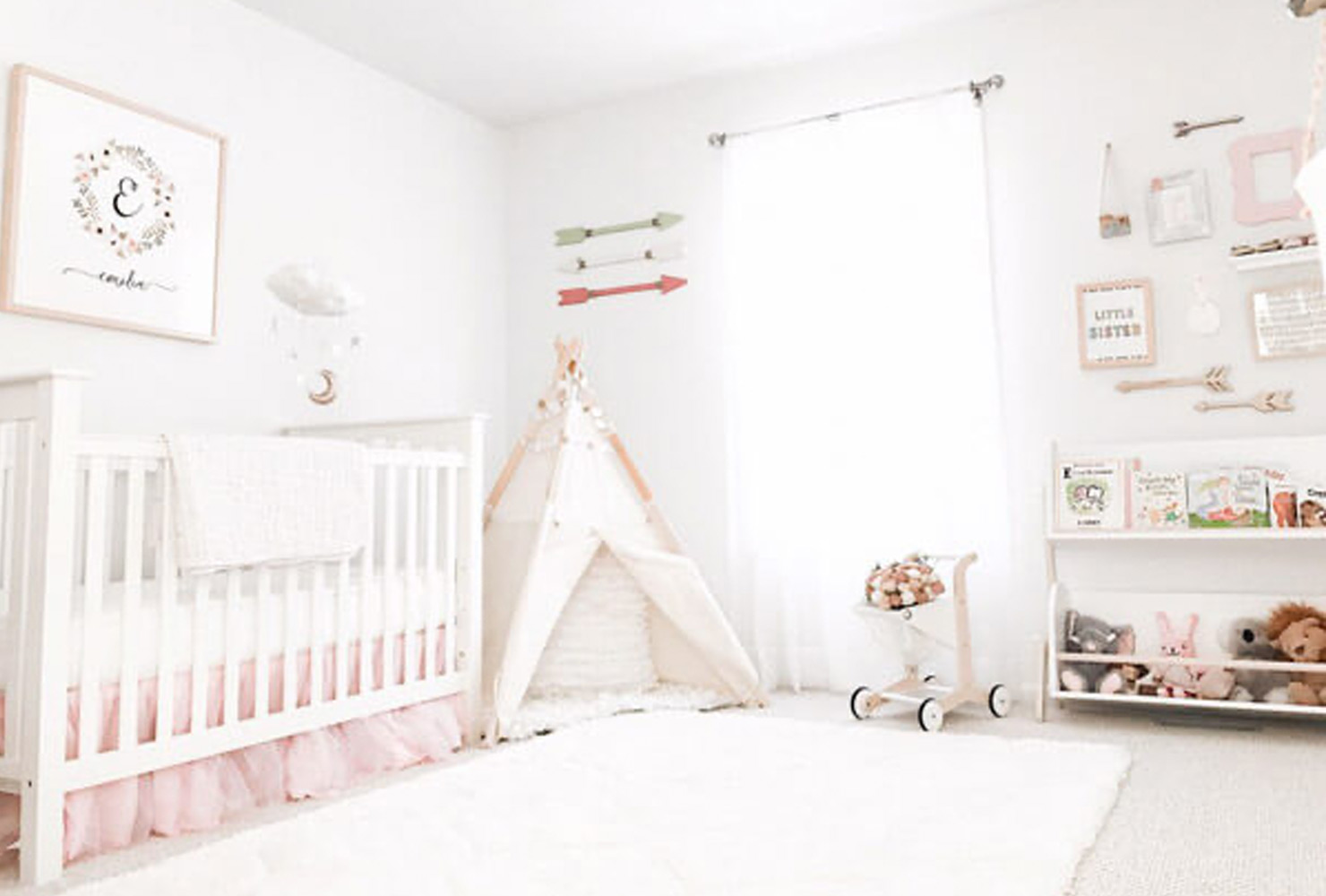 White baby nursery with teepee.