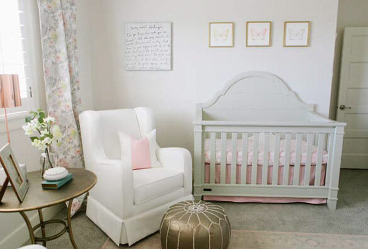Pink and white baby girl nursery.