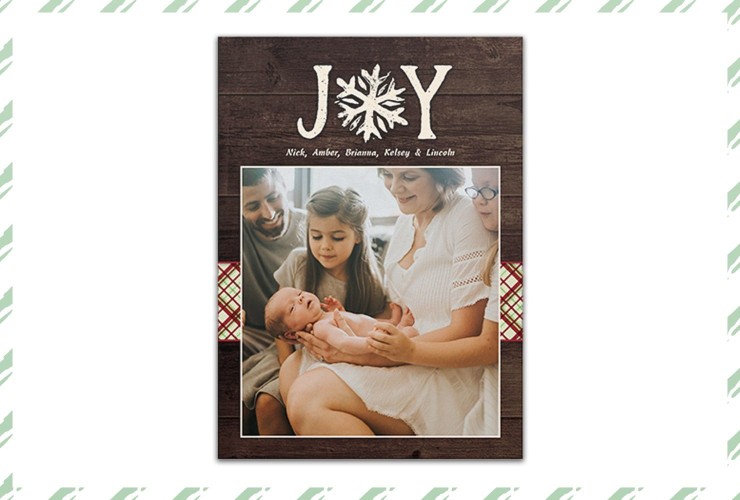 Family with newborn on Christmas card
