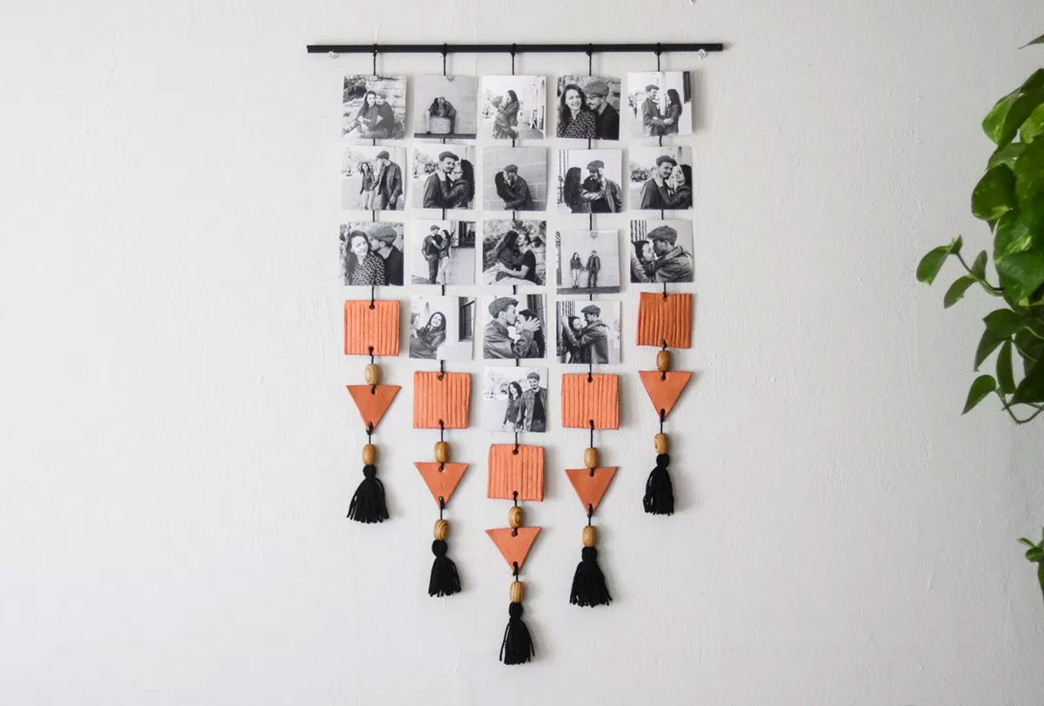 Black and white photo wall hanging with tassel design