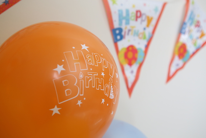 orange birthday balloon