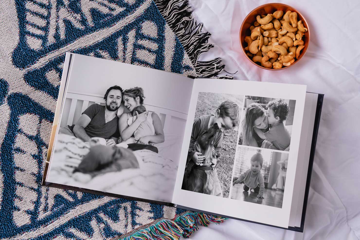 black and white images of family on photo album with hardcover design