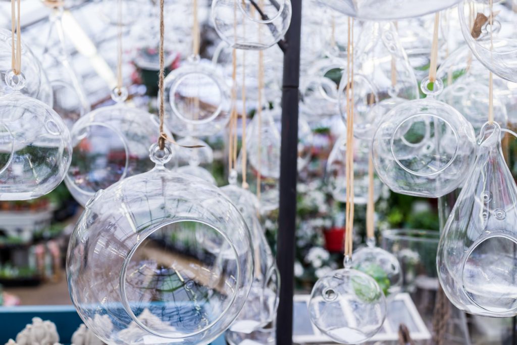 Hanging glass terrariums for crafts.