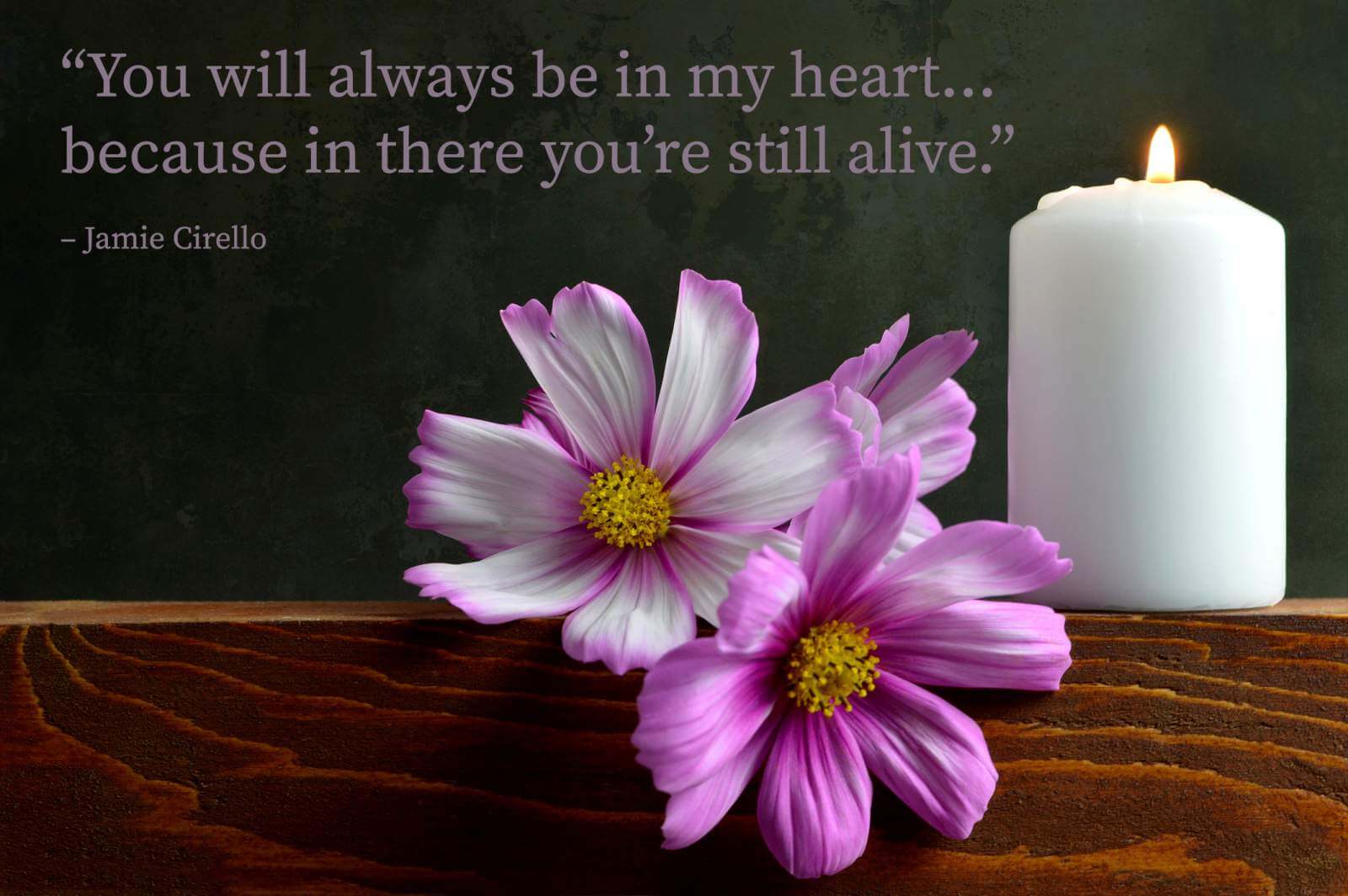 White burning candle and flowers with a miss you dad quote overlay