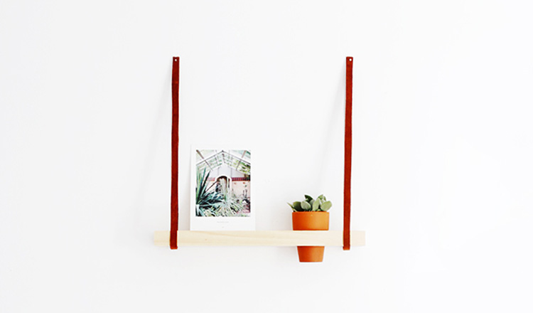 wooden photo shelf