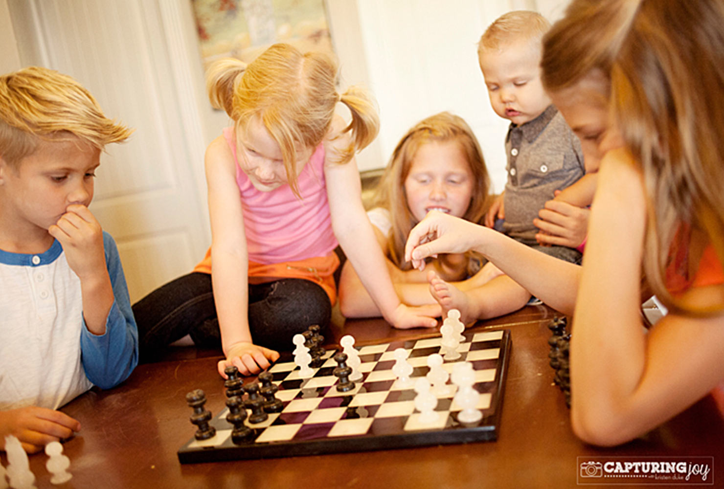 sibling photo ideas playing chess