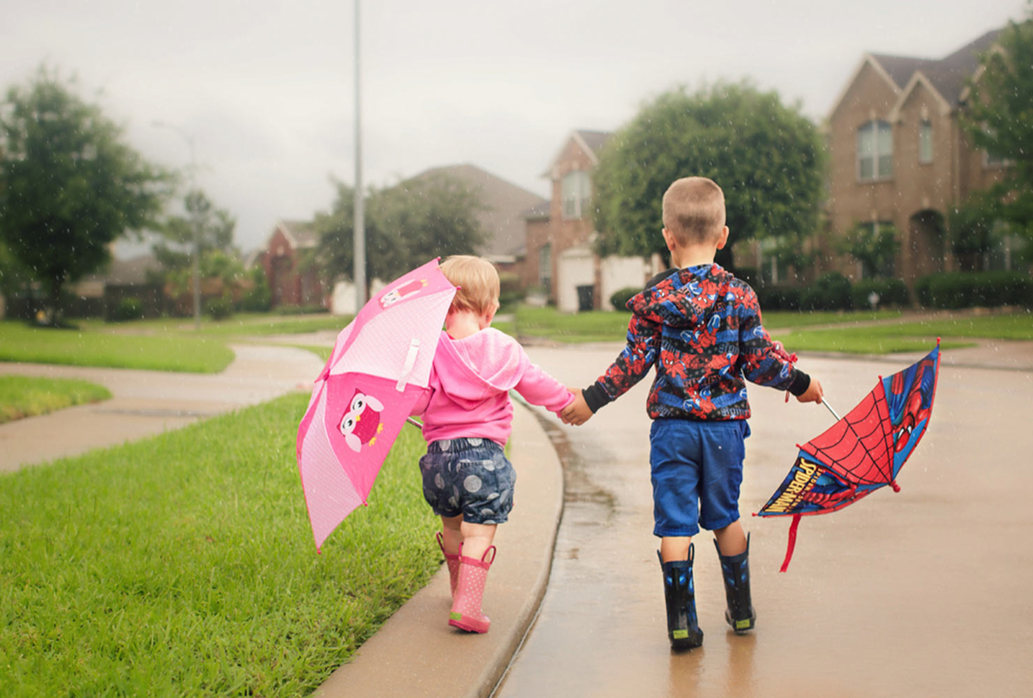 sibling photo ideas rainboots umbrellas