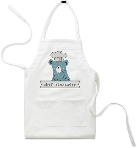 a kids apron with a bear chef on the front