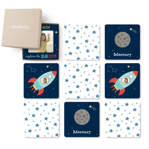 This memory game is decorated with spaceships and planets