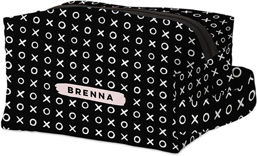 a toiletry bag with an XOXO design for a girls birthday party favor