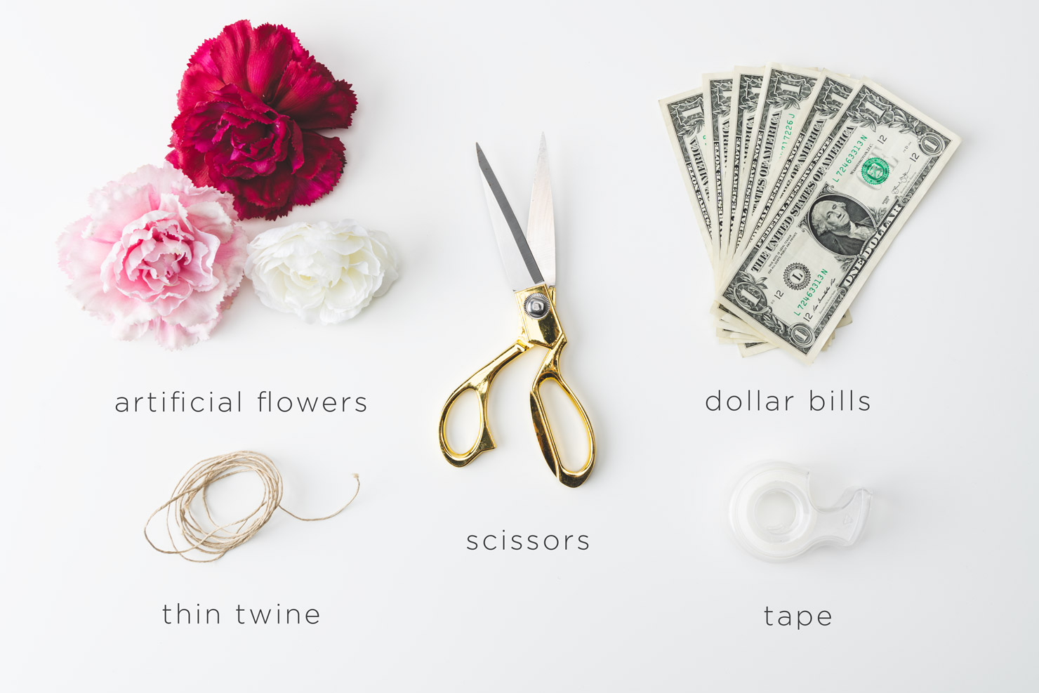 scissors money twine flowers and tape
