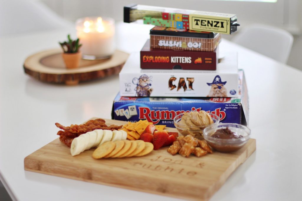 date night ideas at home with board games, snacks, and candles