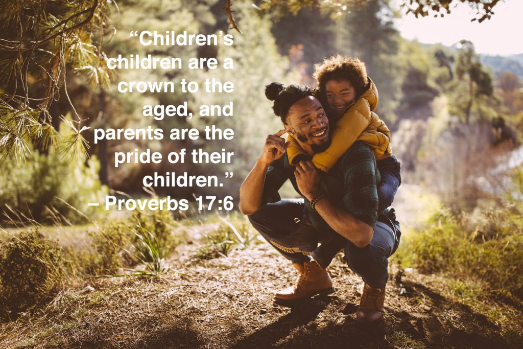 Dad and son bonding and having fun with piggyback ride on mountain with children quotes overlay