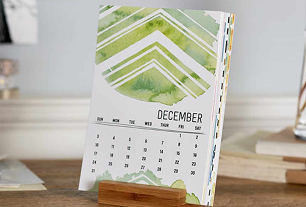 An ombre easel calendar for a home desk.