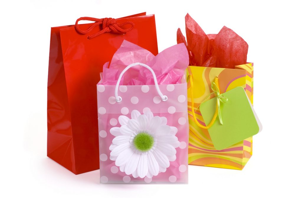 Three colorful gift bags.