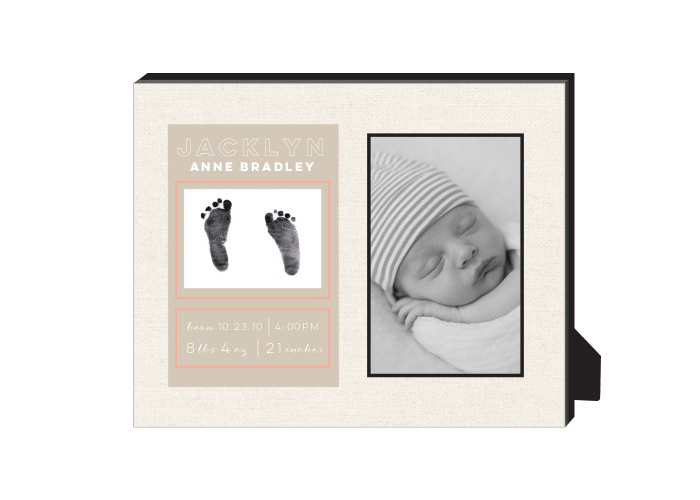 A cute personalized frame for a newborn baby.