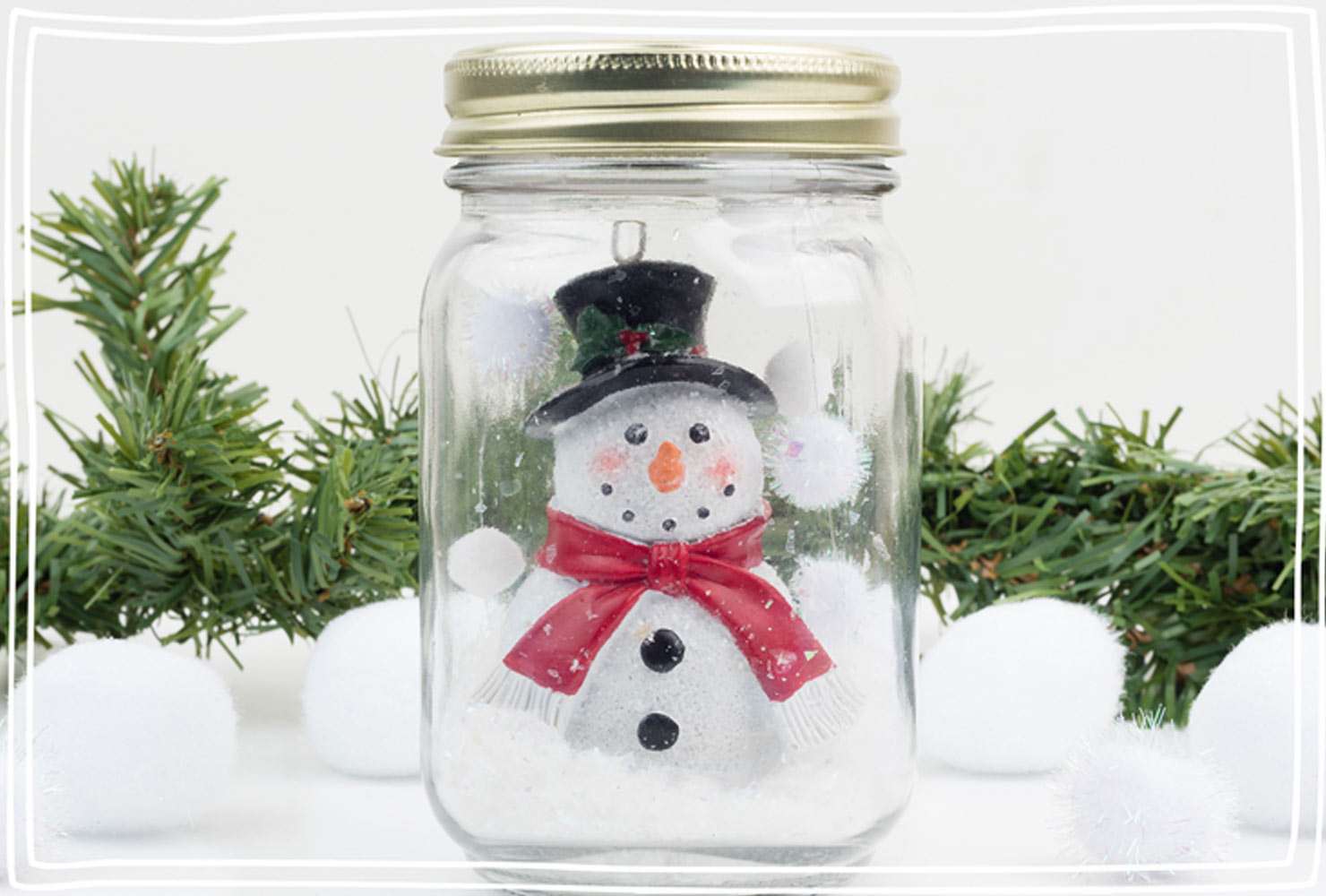 Mason jar snow globe with snowman.