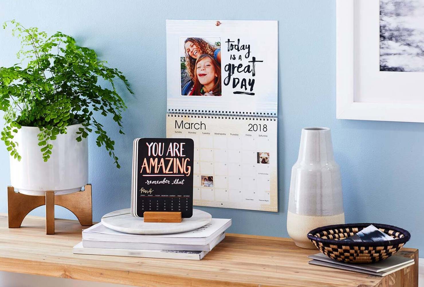 Motivational calendars in a bright office.