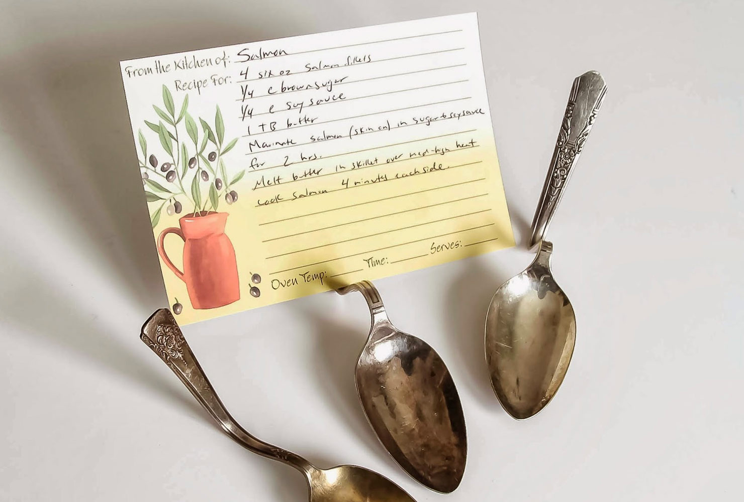 Antique spoons and recipe card.