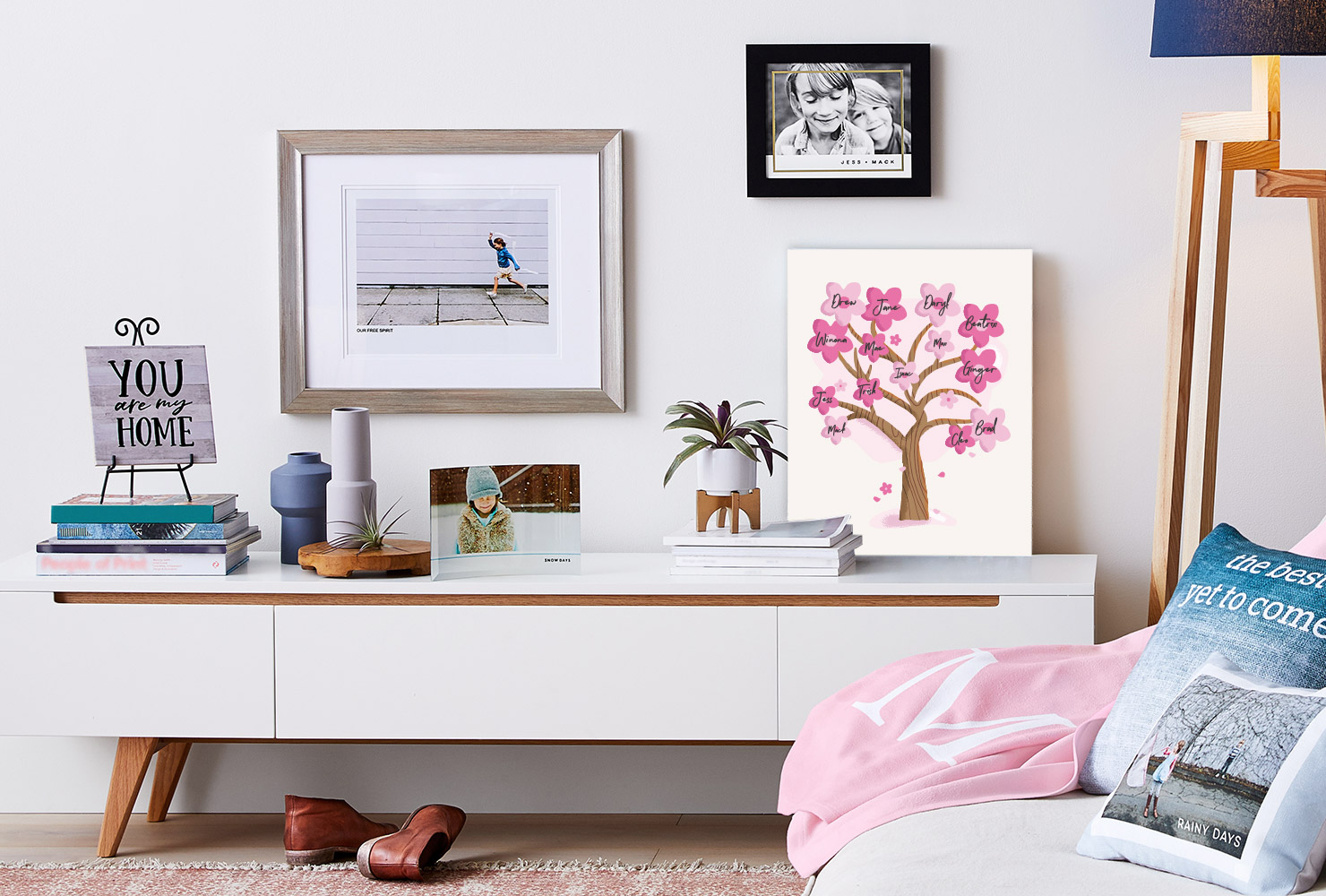 Canvas on a bedroom shelf with a cherry blossom family tree.