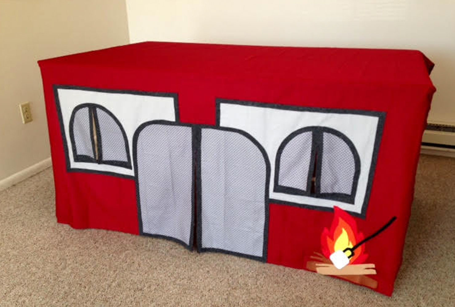 Red indoor camping tent.