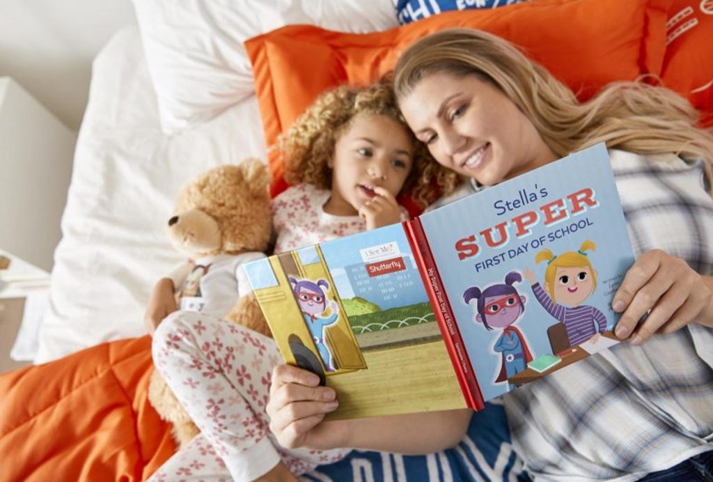 mom and child reading kid personalized story book