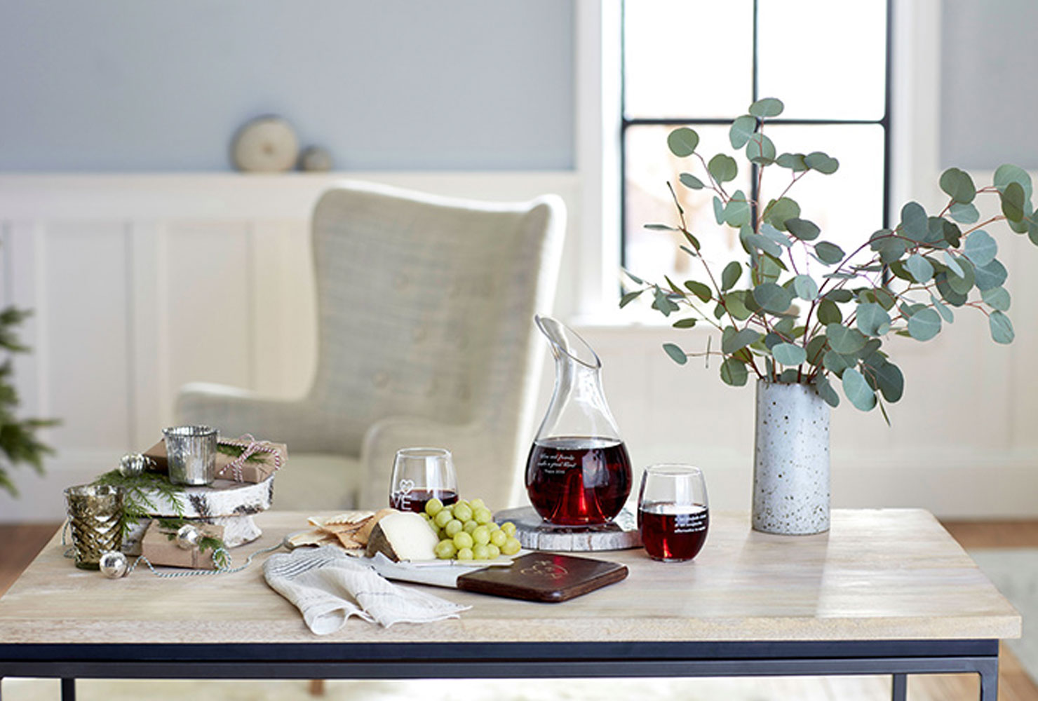 Home decor with decanter and wine glasses.