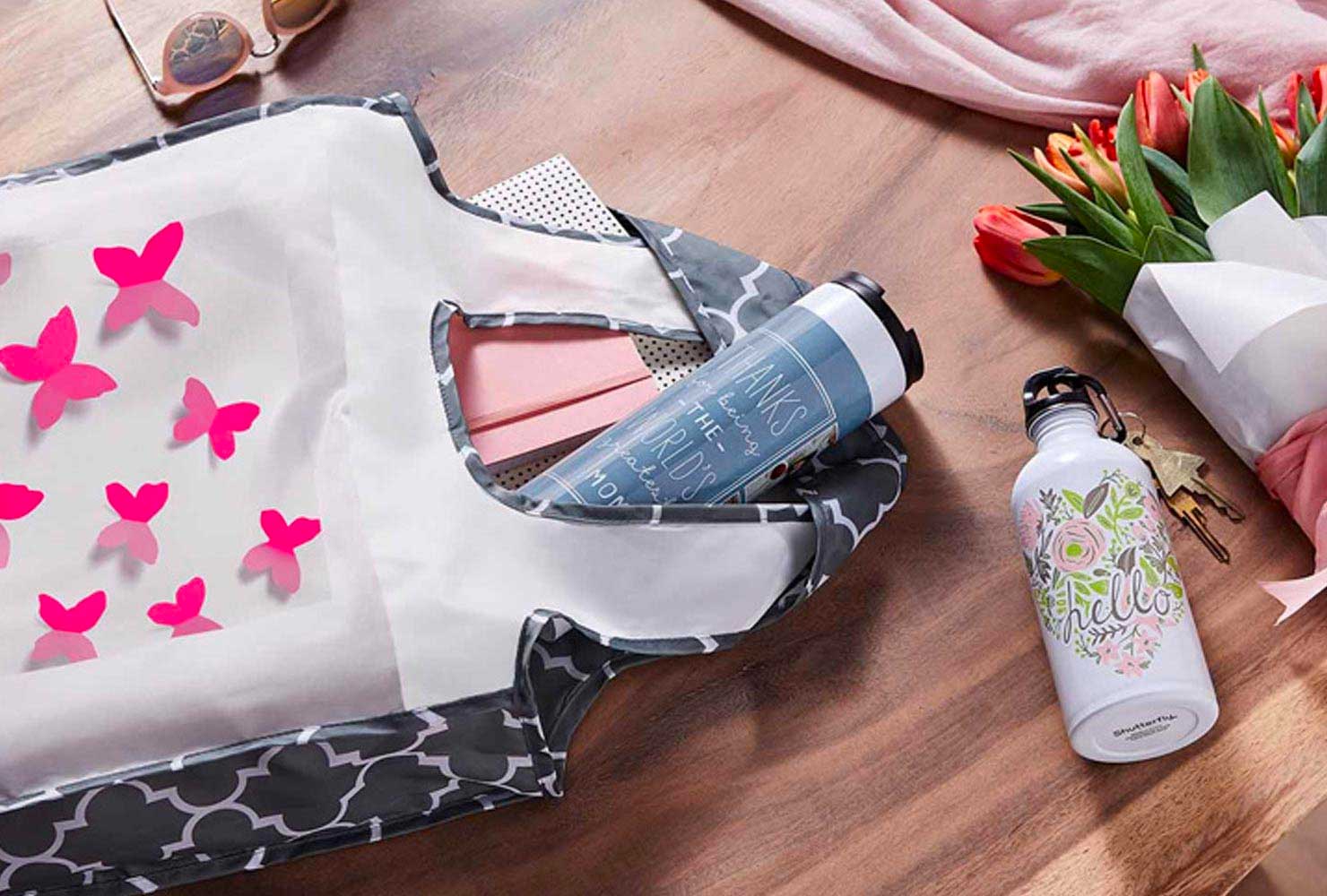 Reusable tote bag with resusable water bottle.