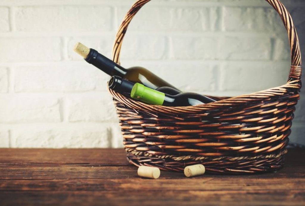 Gift basket full of wine.