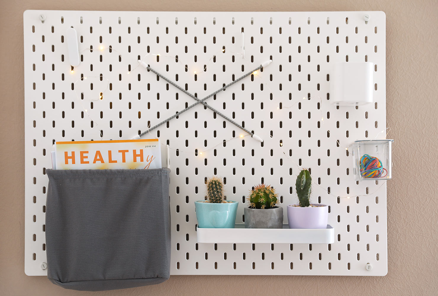 Pegboard with plants.
