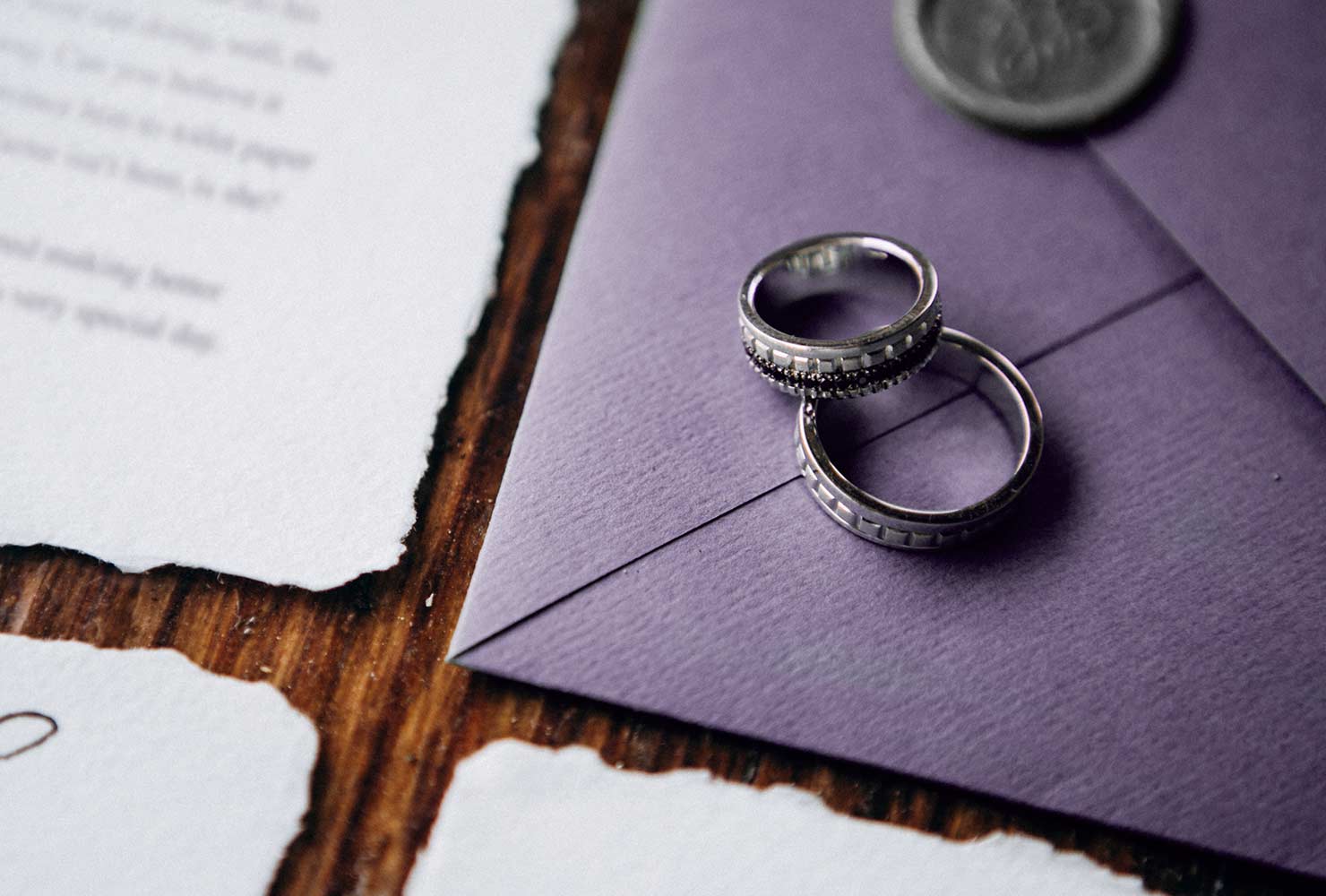 purple envelope with invites