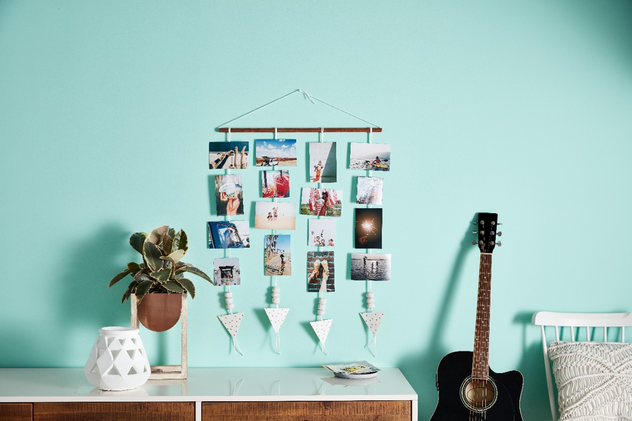 photos hanging on a wall