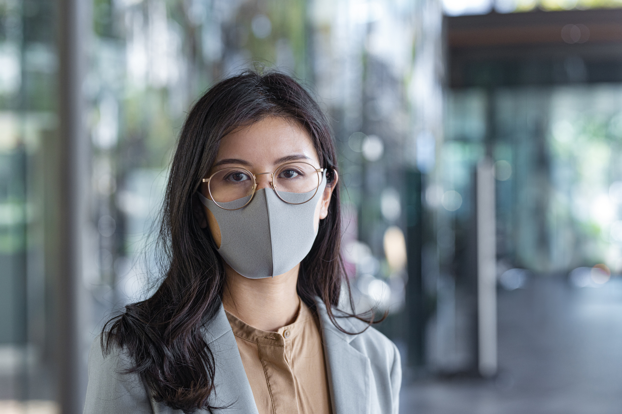 woman wearing face mask with glasses